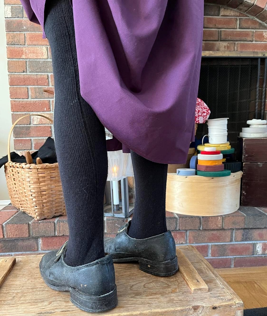 https://www.wmboothdraper.com/wp-content/uploads/2022/06/Black-Wool-Stocking-back-seam-Woman.jpg